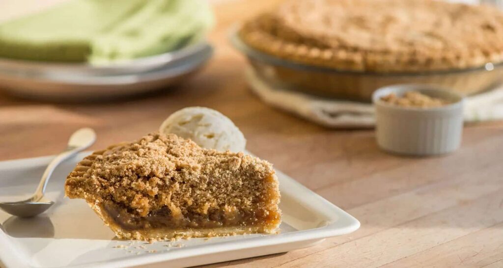 A close up photo of a shoo fly pie made at Bird-in-Hand that is purchasable on their Amish country online store.